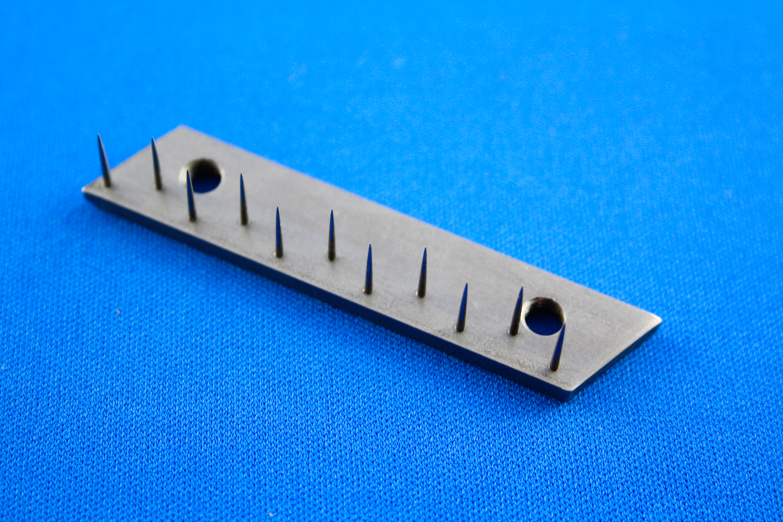 Pin bars for the textile industry